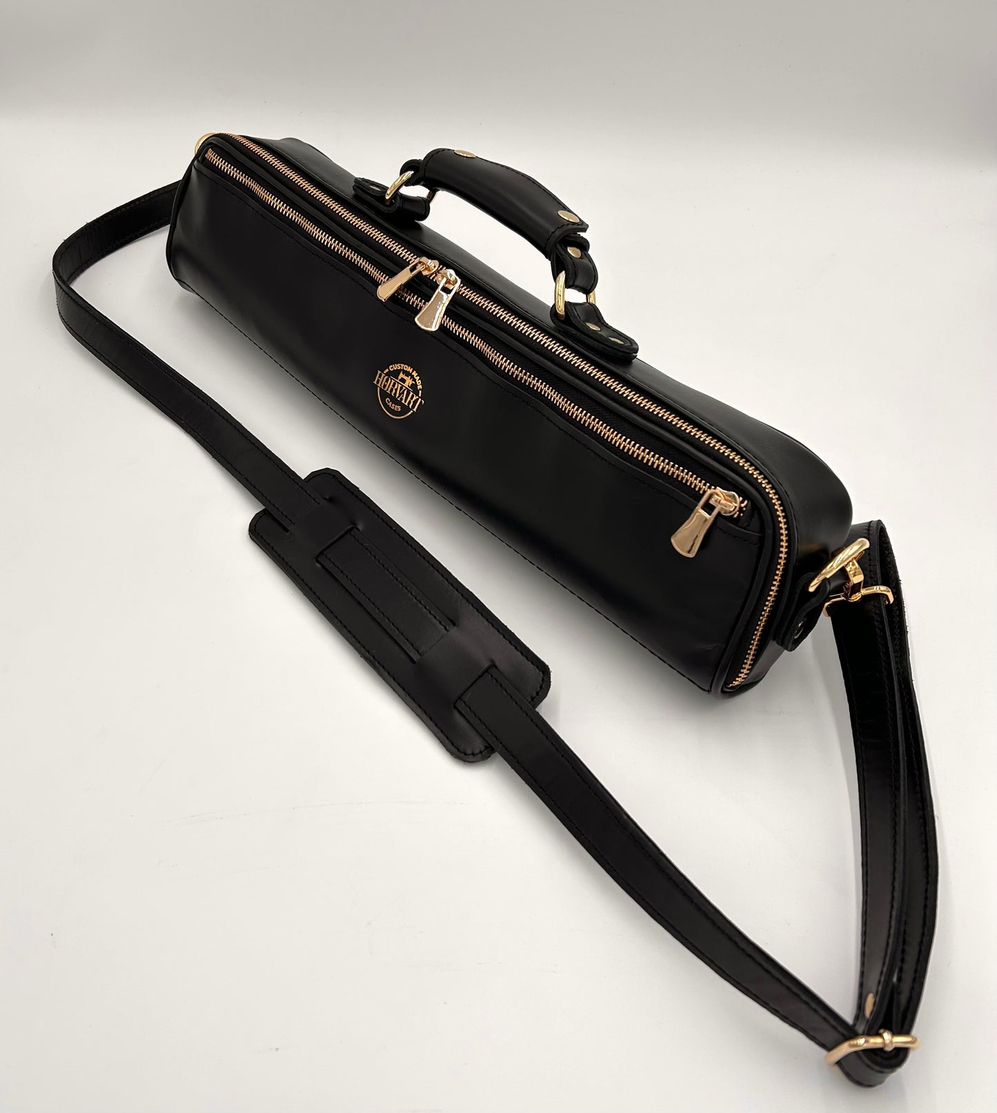 Flute Bag - The black one with gold-toned materials.