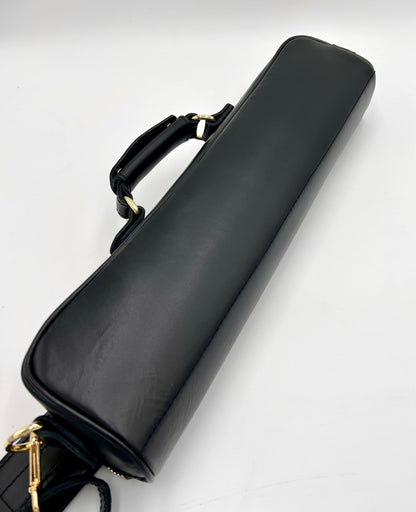 Flute Bag - The black one with gold-toned materials.